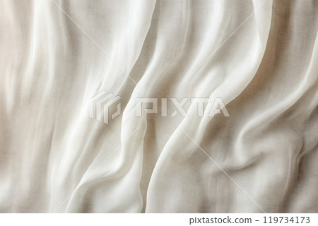 white luxurious background, the fabric lies in soft waves. 119734173