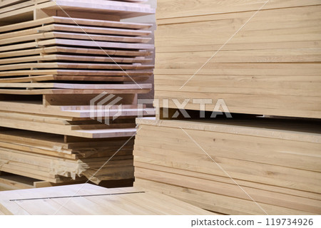 Wooden Parts and Boards Stored in Warehouse Ready for CNC Machine Processing Wooden Parts and Boards Stored in Warehouse Ready for CNC Machine Processing 119734926