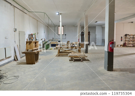 Interior of Wood Processing Industry Featuring CNC Cutting Machines and Wood Processing Equipment Interior of Wood Processing Industry Featuring CNC Cutting Machines and Wood Processing Equipment 119735304