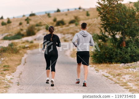 A Couple's Energizing Morning Run in the Mountains 119735403