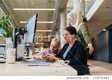 In a modern startup office, a diverse group of young professionals collaboratively tackles various business problems and challenges, surrounded by their engaged colleagues, fostering innovation and 119735483