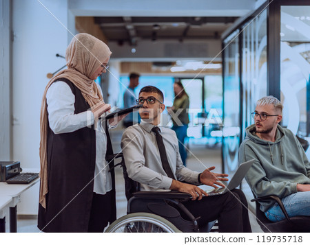 Young group of business people brainstorming together in a startup space, discussing business projects, investments, and solving challenges. 119735718