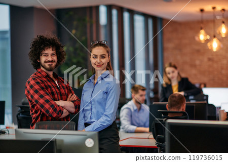 Corporate Collaboration: European Blonde Businesswoman and Colleague Standing in Modern Office Corporate Collaboration: European Blonde Businesswoman and Colleague Standing in Modern Office 119736015