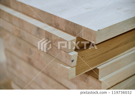 Wooden Parts and Boards Stored in Warehouse Ready for CNC Machine Processing 119736032