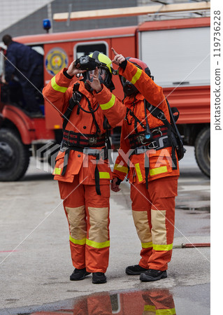 Firefighter Team Learning Thermal Camera Usage During Training Session 119736228