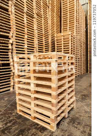 Stack of raw wood, Lumber warehouse storage wooden. Timber goods storehouse. Stack of raw wood, Lumber warehouse storage wooden. Timber goods storehouse. 119737052