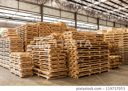 Stack of raw wood, Lumber warehouse storage wooden. Timber goods storehouse.  119737053