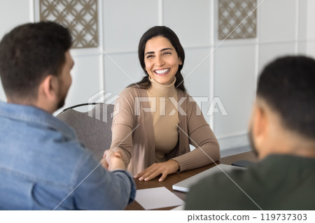 Happy successful Latin professional woman getting job Happy successful Latin professional woman getting job 119737303