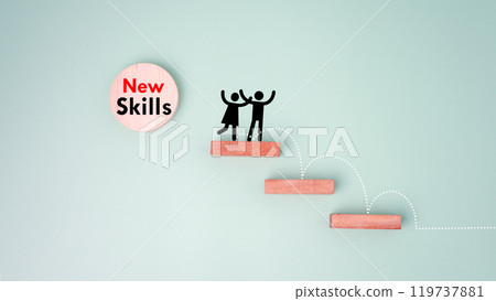 Skills icon and human drawing on wooden block. Upskilling and personal development concept. Employee thinking, digital upskill, Skill training, education, learning, ability. Upskilling, reskilling. 119737881