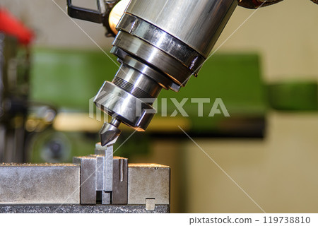 The angular milling process on NC milling machine with chamfer tools. 119738810