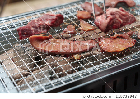 A scene from the barbecue. Beef tongue and skirt steak. 119738948