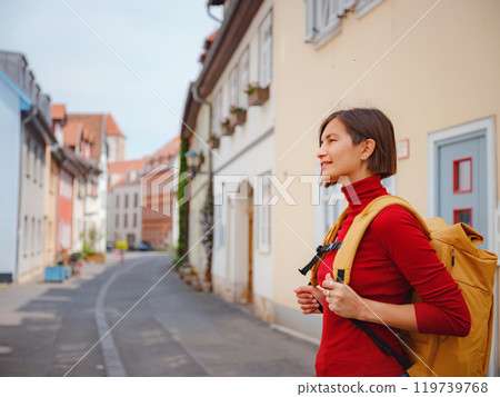 Tourist woman explores beautiful city of Erfurt, Tourist woman explores beautiful city of Erfurt, 119739768