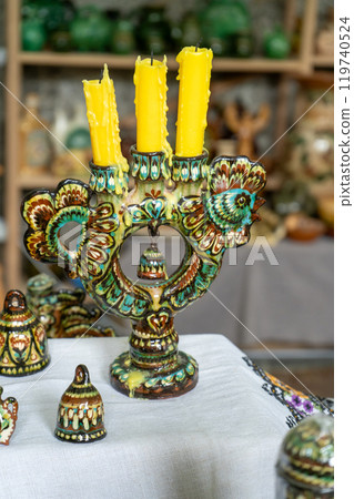 Ceramic candlestick for three candles. Ukrainian decor. Figurine in the form of a rooster bird. Painting on clay. 119740524