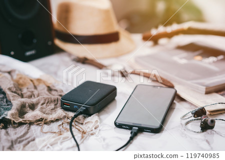 Charging the smartphone Charging the smartphone 119740985