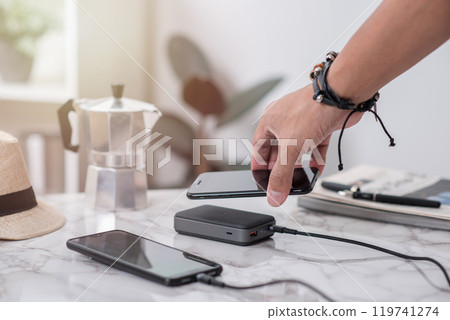 Charging the smartphone 119741274