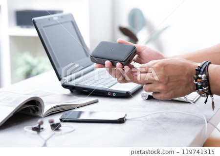 Charging the smartphone 119741315