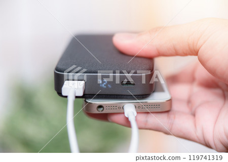 Charging the smartphone Charging the smartphone 119741319