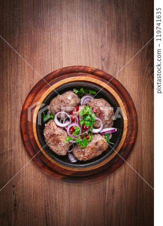 fried apkhazura, cutlet in a fat grid, spicy, Georgian dish, fried on ketsi, homemade, no people, 119741635