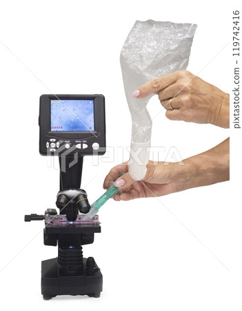 microscope and sperm in studio microscope and sperm in studio 119742416