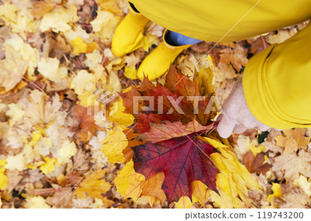 girl in yellow rubber 119743200