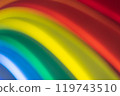 Blurry closeup of colors forming an arched rainbow. Art background 119743510