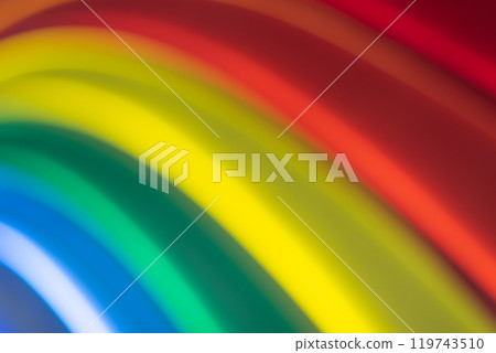 Blurry closeup of colors forming an arched rainbow. Art background Blurry closeup of colors forming an arched rainbow. Art background 119743510