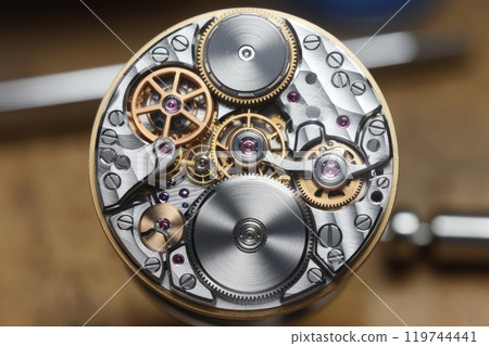 Intricate clockwork mechanism showing precision engineering and craftsmanship Intricate clockwork mechanism showing precision engineering and craftsmanship 119744441