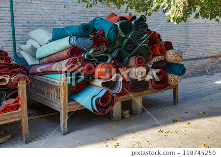 Carpets for sale at a street market in Samarkand, Uzbekistan Carpets for sale at a street market in Samarkand, Uzbekistan 119745250
