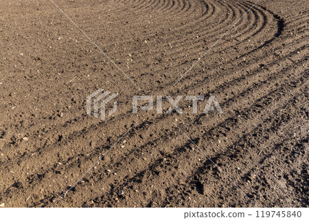 fertile soil in spring during the preparation for sowing fertile soil in spring during the preparation for sowing 119745840