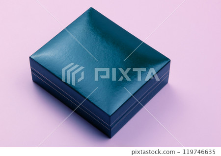 Packaging box for jewelry on a colored background 119746635
