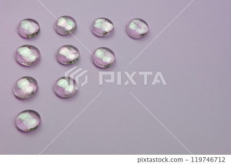 Glass drops on a colorful background with copy space, beautiful abstract texture with place for text 119746712