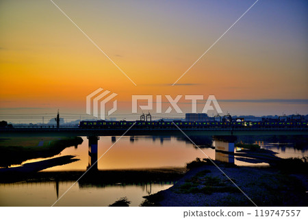 Noborito: View of the Odakyu Line at sunrise from the Tamagawa Suidobashi Bridge Noborito: View of the Odakyu Line at sunrise from the Tamagawa Suidobashi Bridge 119747557