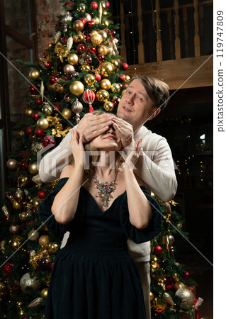 joy woman christmas celebration decoration december man tree happiness smiling winter family 119747809