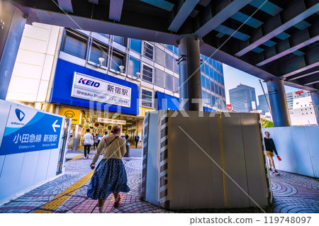 Tokyo cityscape in Japan: West exit of Shinjuku Station...View of KEIO Shinjuku Station and Keio Department Store from the covered passageway = October 21st 119748097