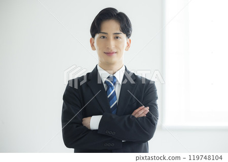 A young businessman 119748104