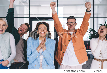 Group of diverse business people celebrating victory 119749240