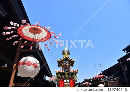 Takayama City, Gifu Prefecture, Japan: Spring Takayama Festival, Karako doll floats and old townscape, Japanese-style lanterns and beautiful blue sky Takayama City, Gifu Prefecture, Japan: Spring Takayama Festival, Karako doll floats and old townscape, Japanese-style lanterns and beautiful blue sky 119749340