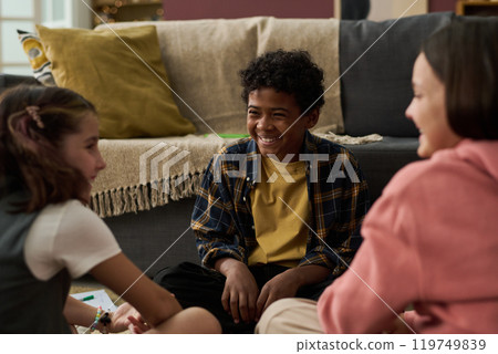 Smiling Children Engaging in Fun Indoor Activity 119749839