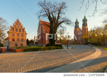 Cathedral Basilica and historical buildings at dusk in Poznan, Poland 119750004