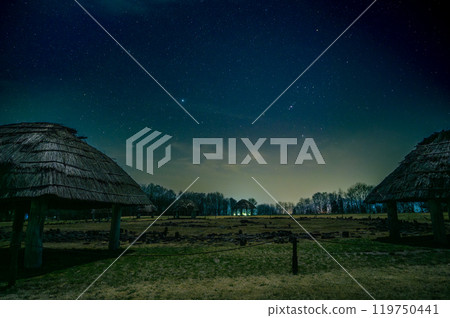 The Jomon World Heritage Oyu Stone Circle and the stars in the night sky illuminated by moonlight 119750441