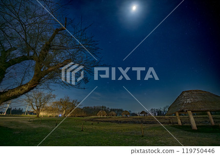The Jomon World Heritage Oyu Stone Circle and the stars in the night sky illuminated by moonlight 119750446