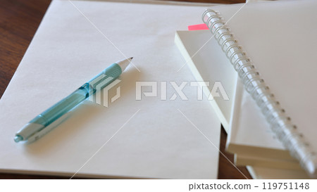 Studying with textbooks and reference books to prepare for exams to obtain work qualifications Studying with textbooks and reference books to prepare for exams to obtain work qualifications 119751148