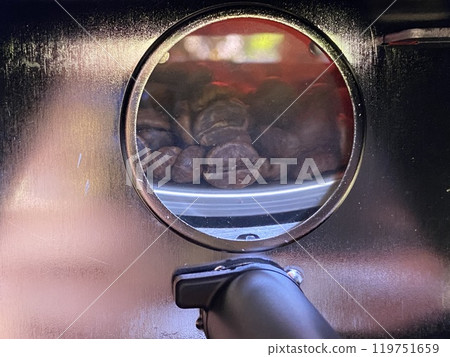 Coffee beans in a coffee machine, closeup of photo 119751659