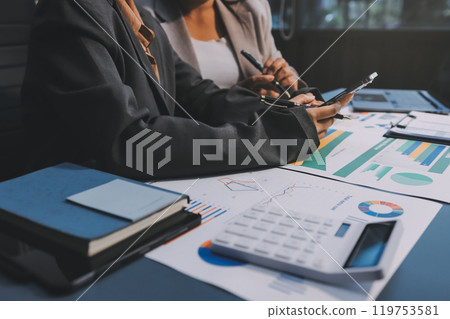 Team of business people are meeting to analyze data for marketing plan,Market research reports and income statistics, Financial and Accounting concept. Team of business people are meeting to analyze data for marketing plan,Market research reports and income statistics, Financial and Accounting concept. 119753581