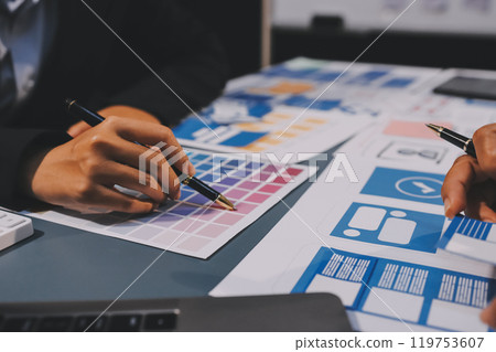 The designer team is designing the uxui system to make the uxui system work well on new phones and support system updates. Website development concept UI UX front end designer The designer team is designing the uxui system to make the uxui system work well on new phones and support system updates. Website development concept UI UX front end designer 119753607