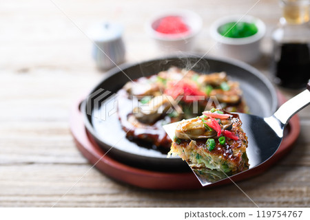 Kakioko (okonomiyaki with oysters) Kakioko (okonomiyaki with oysters) 119754767