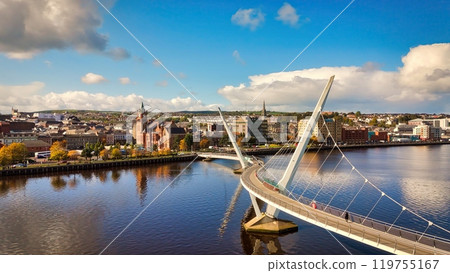 Peace Bridge over River Foyle in the City of Derry aka Londonderry in Northern Ireland aerial view Peace Bridge over River Foyle in the City of Derry aka Londonderry in Northern Ireland aerial view 119755167