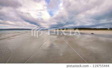 Low High speed FPV Flight over a beach at the west coast of Ireland - A calm and serene beach scene 119755444