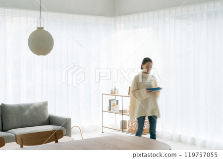 A woman carrying food 119757055