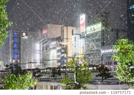Winter in Kawasaki: Snow-covered city night view in front of Kawasaki Station [Kawasaki City, Kanagawa Prefecture] 119757171